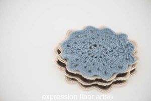 http://www.expressionfiberarts.com/products/free-crochet-fancy-flower-coaster-pattern.html